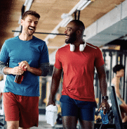 Two veterans laughing at workout session